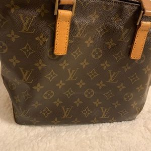 LV monogram-print shoulder bag. Top zip 9.75" drop
15"W x 13"H x 6"D